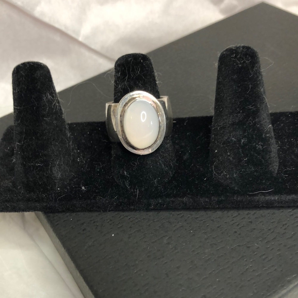 Silver ring signed by make